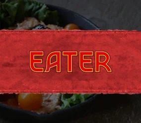 eater in lettering over a food plate